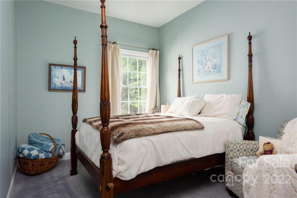 8804 Brentfield Road Huntersville, NC 28078 - Photo 24 of 39 a bedroom with a bed and a window