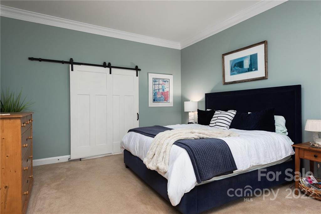 8804 Brentfield Road Huntersville, NC 28078 - Photo 27 of 39 a bedroom with a bed and a painting on the wall