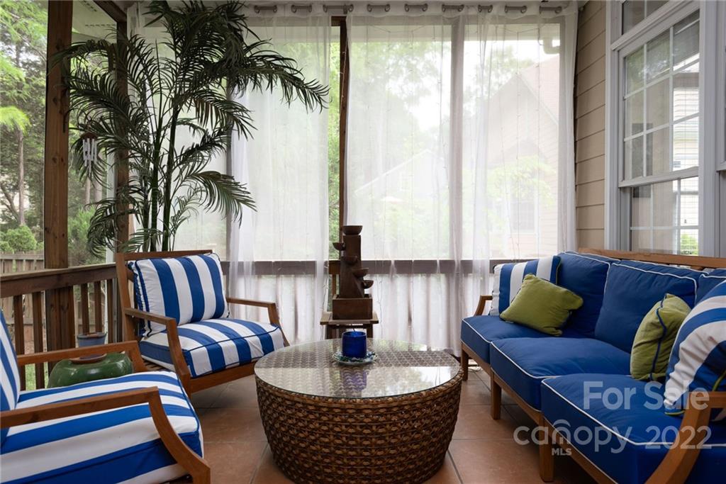8804 Brentfield Road Huntersville, NC 28078 - Photo 33 of 39 a living room with furniture and a potted plant