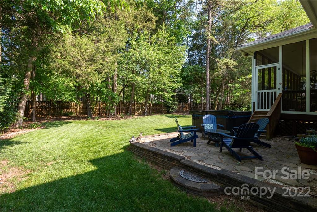 8804 Brentfield Road Huntersville, NC 28078 - Photo 34 of 39 a view of a backyard with a table and chairs