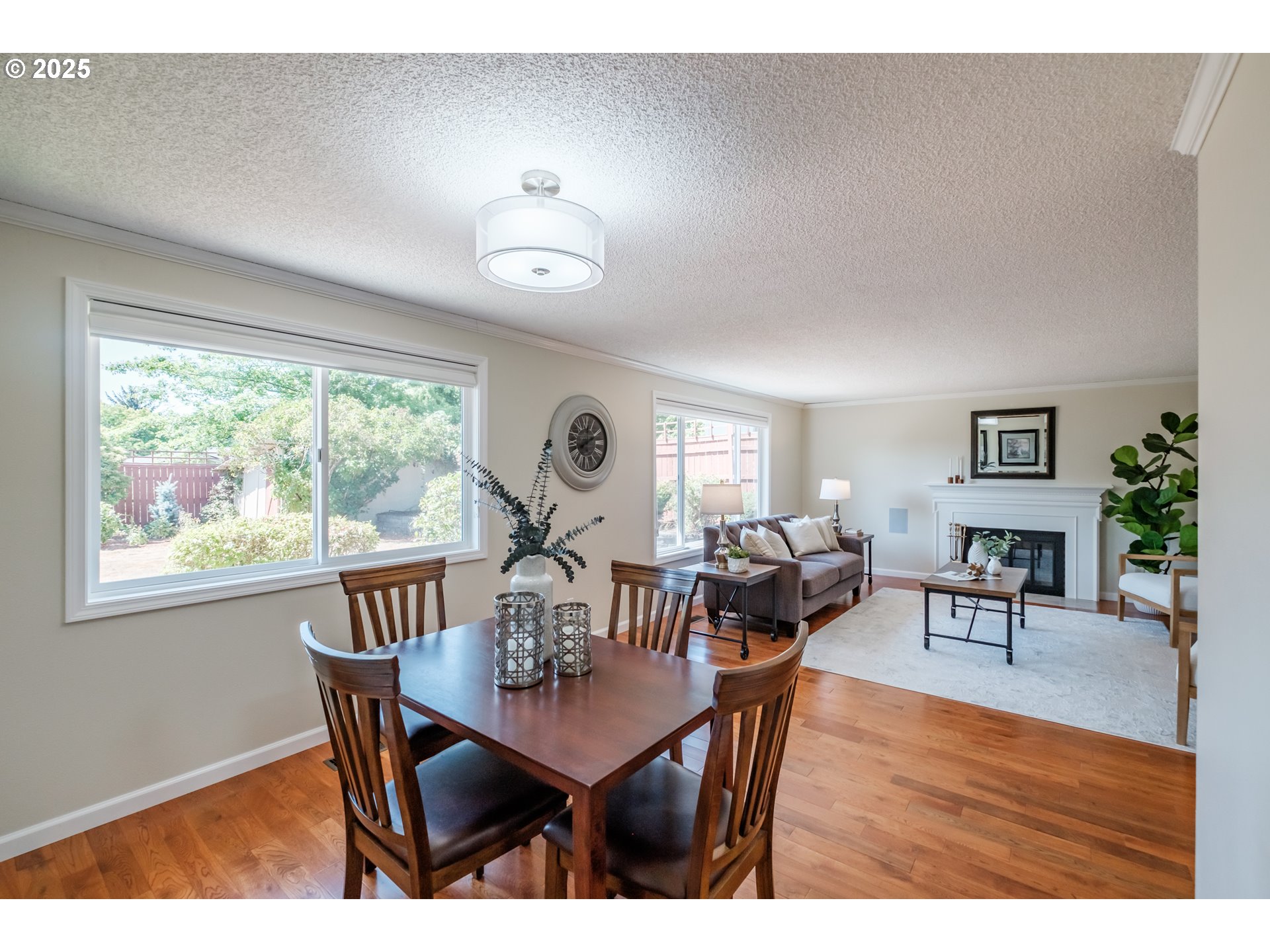 2040 Northwest 23rd Street Corvallis, OR 97330 - Photo 13 of 48 a view of a dining room with furniture window and wooden floor