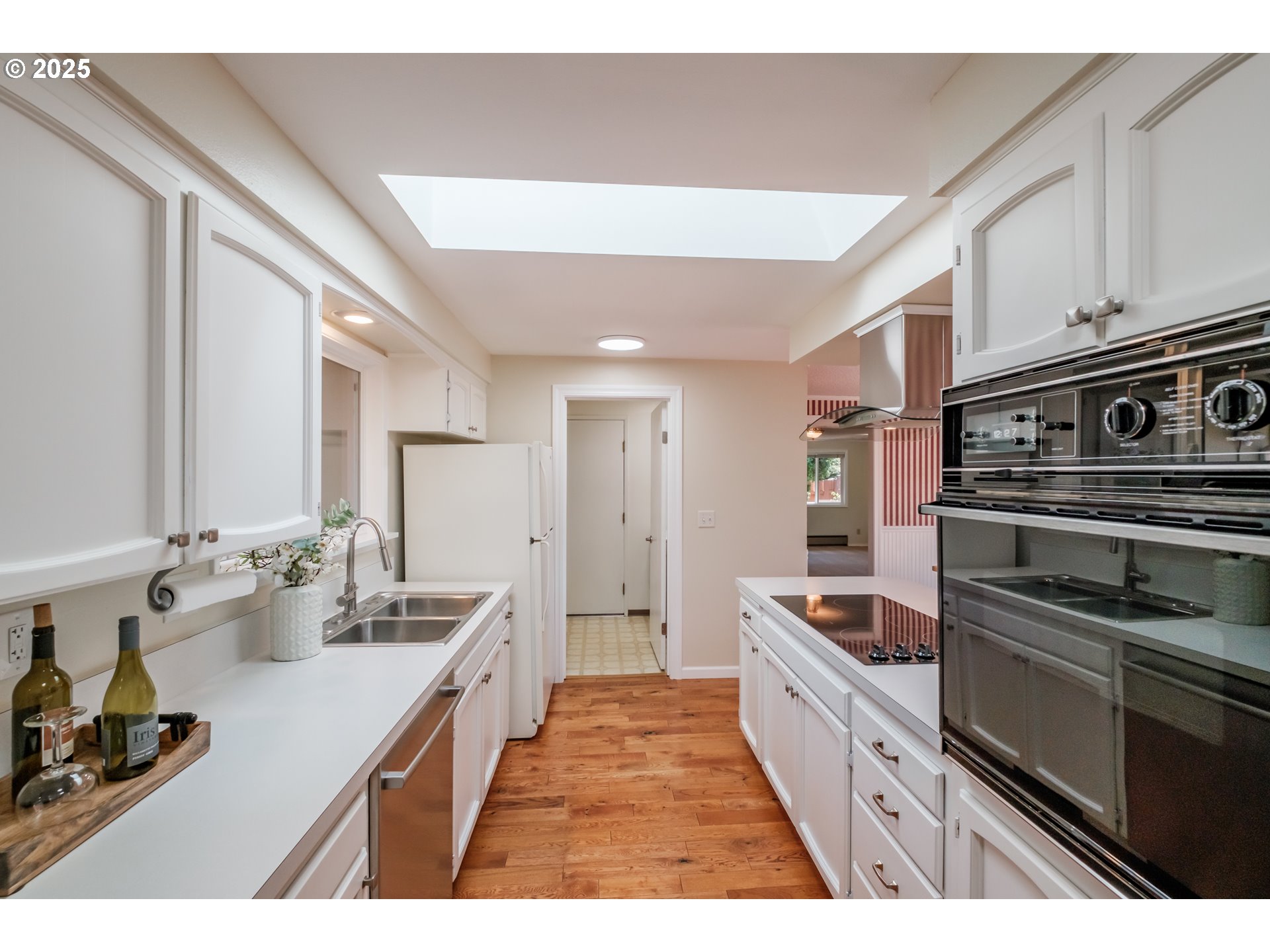 2040 Northwest 23rd Street Corvallis, OR 97330 - Photo 17 of 48 a kitchen with stainless steel appliances granite countertop a sink stove and refrigerator