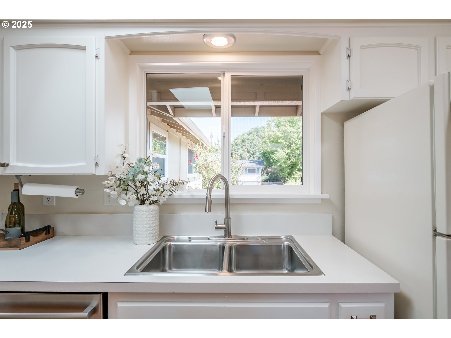 2040 Northwest 23rd Street Corvallis, OR 97330 - Photo 18 of 48 a kitchen with a sink and a window