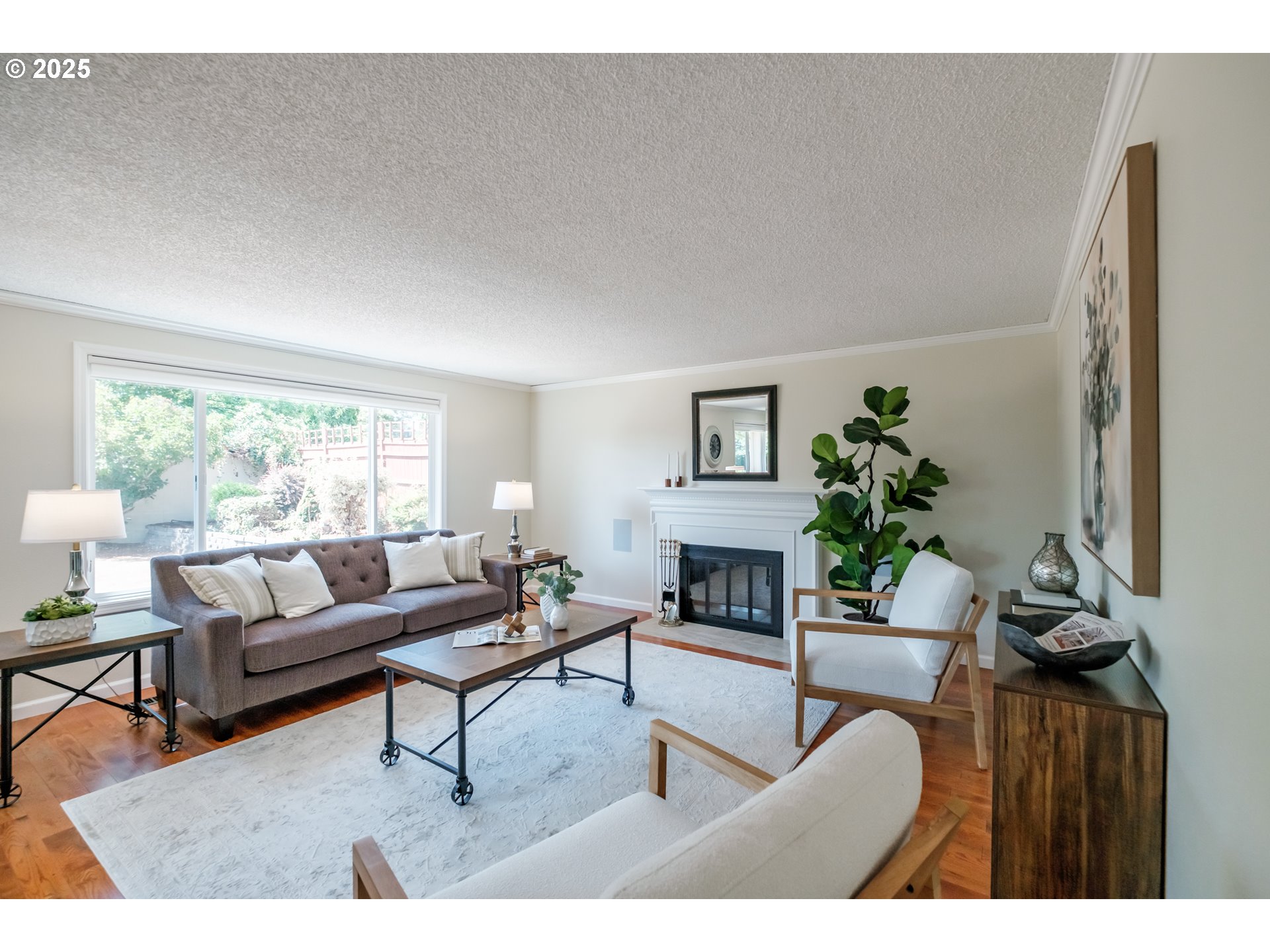 2040 Northwest 23rd Street Corvallis, OR 97330 - Photo 10 of 48 a living room with furniture and a potted plant