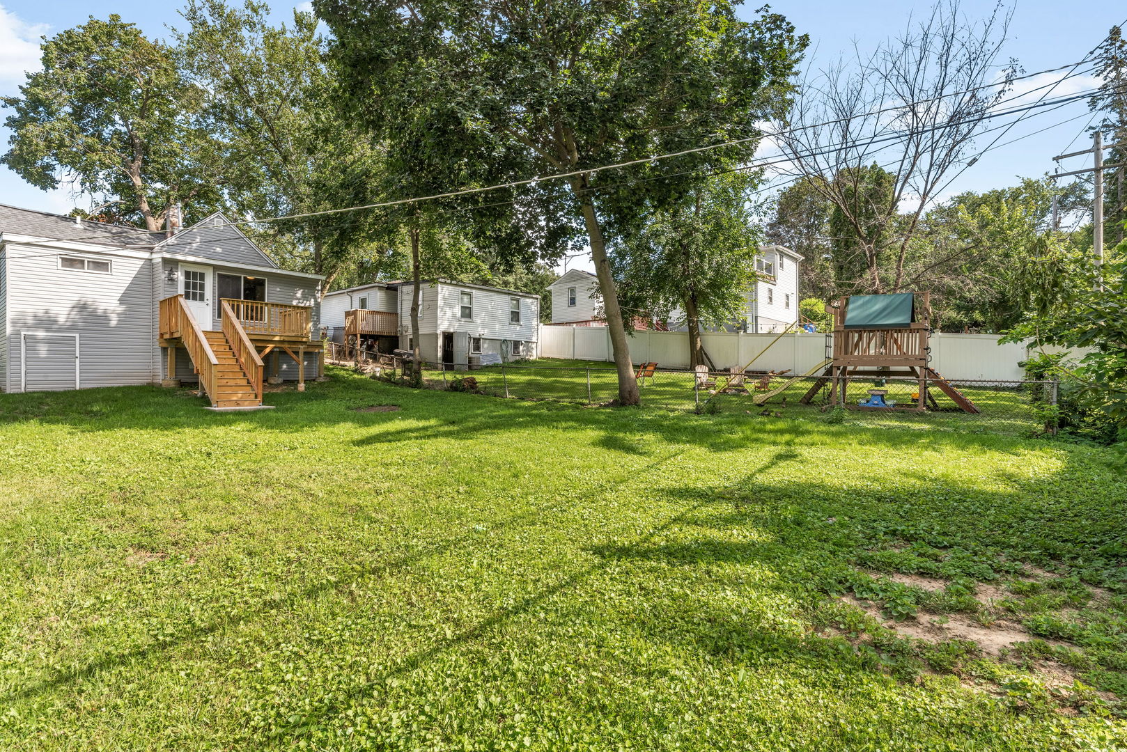 3821 East Wonder Lake Road Wonder Lake, IL 60097 - Photo 17 of 28 a view of a house with backyard and sitting area