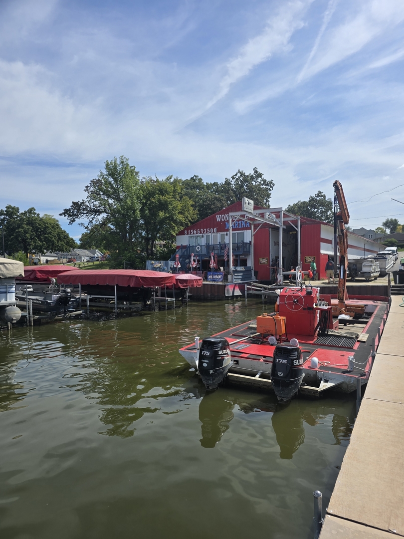 3821 East Wonder Lake Road Wonder Lake, IL 60097 - Photo 21 of 28 a view of a lake with boats and trees