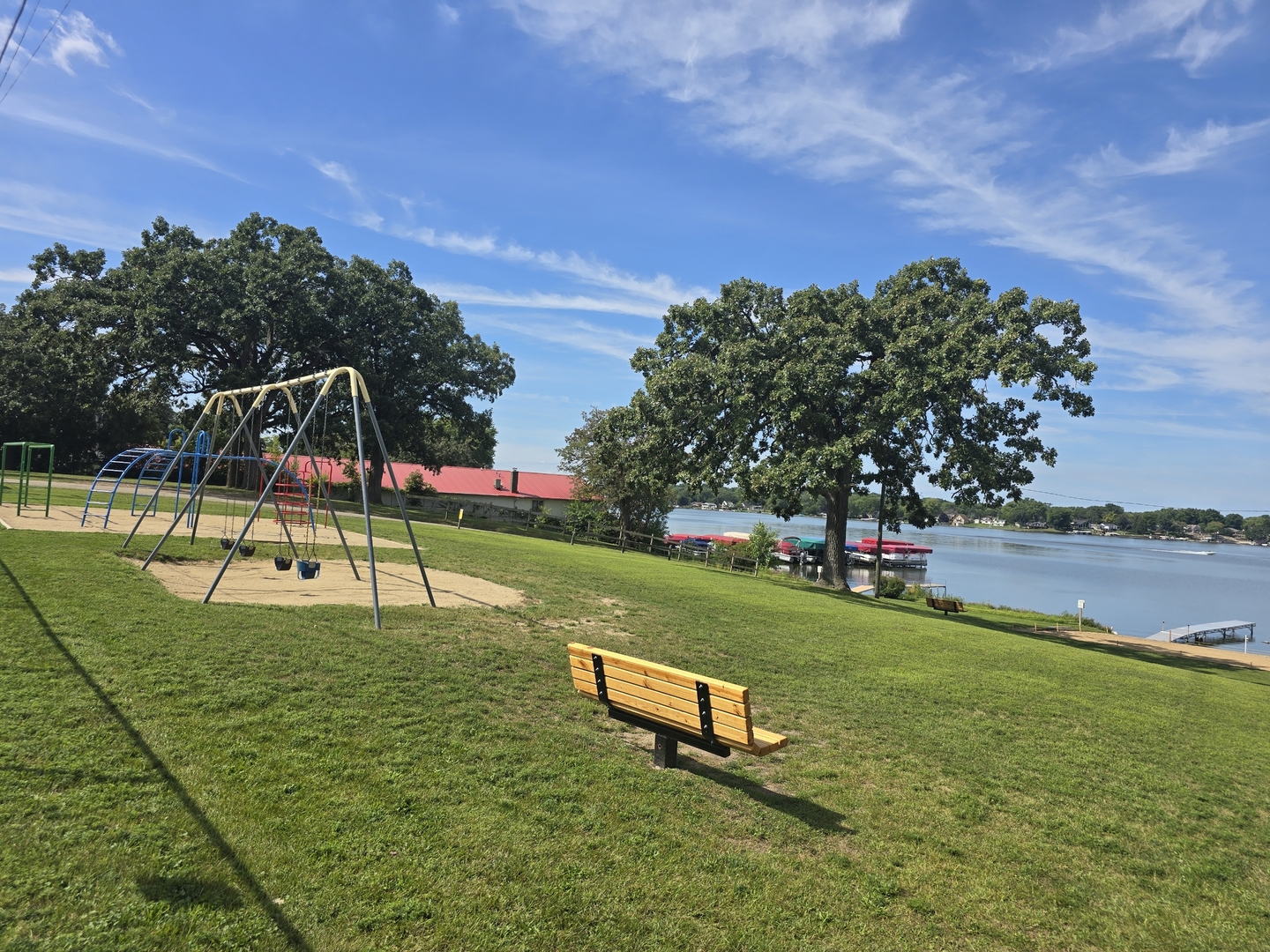 3821 East Wonder Lake Road Wonder Lake, IL 60097 - Photo 25 of 28 a view of a park with swings and slides