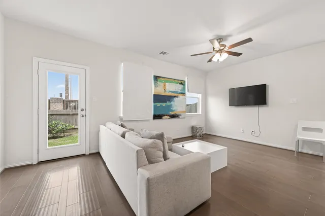 a kitchen with appliances a sink and cabinets