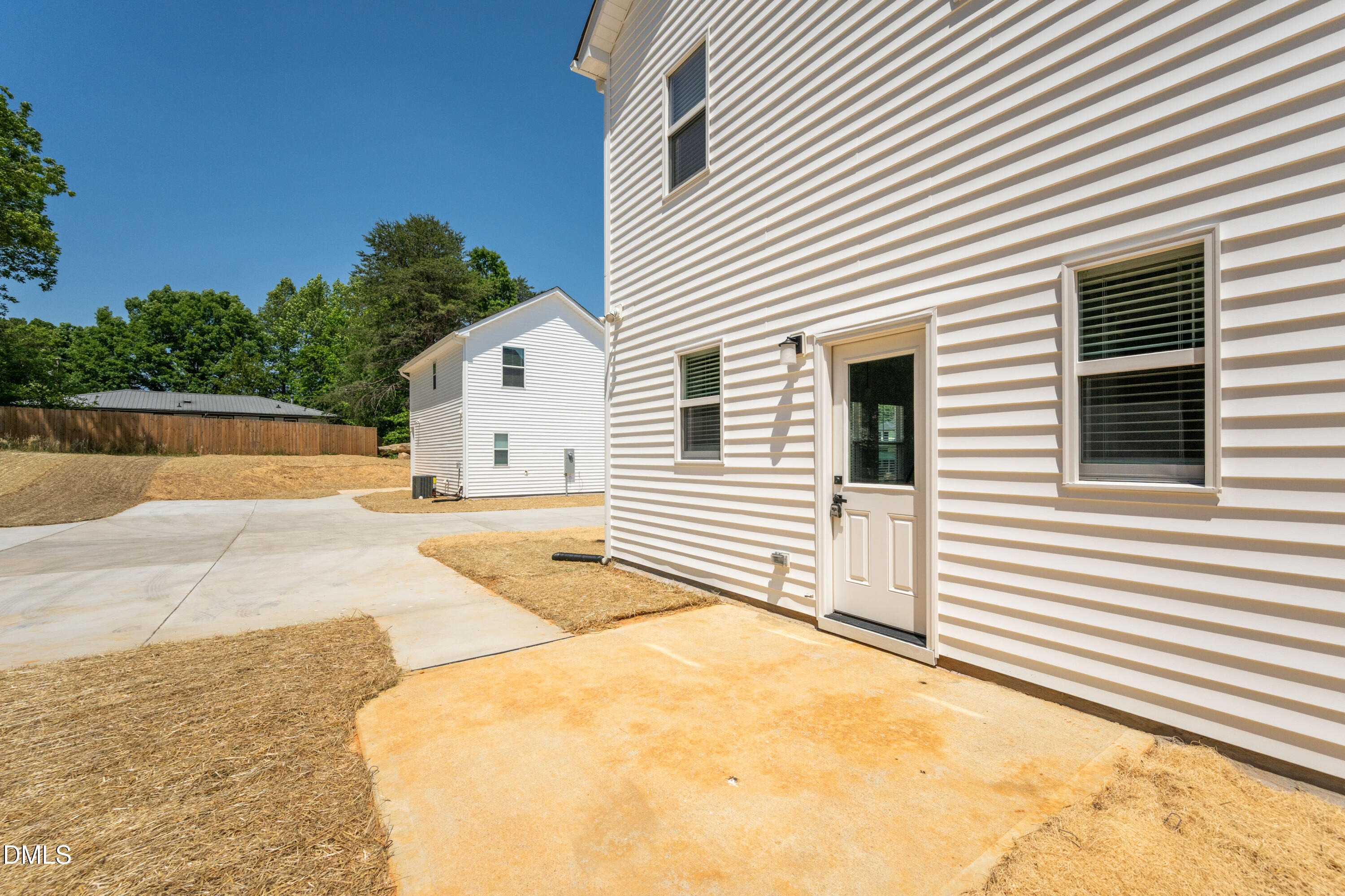 1196 Hurdle Mills Road Roxboro, NC 27573 - Photo 48 of 50 a view of a white house