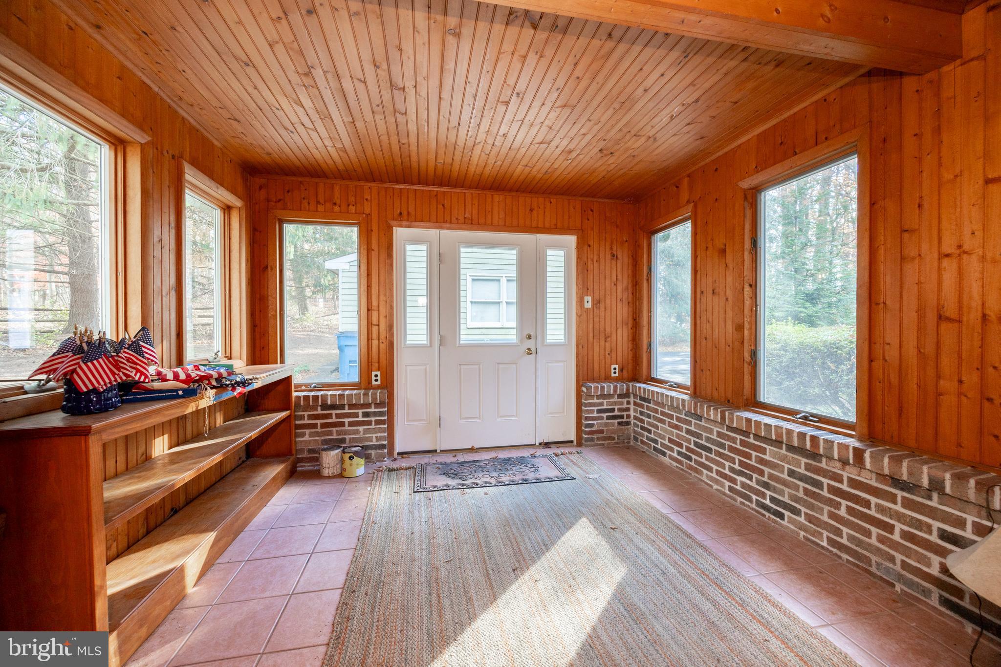 741 Haines Mill Road West Chester, PA 19382 - Photo 19 of 25 a room with lot of large windows and furniture