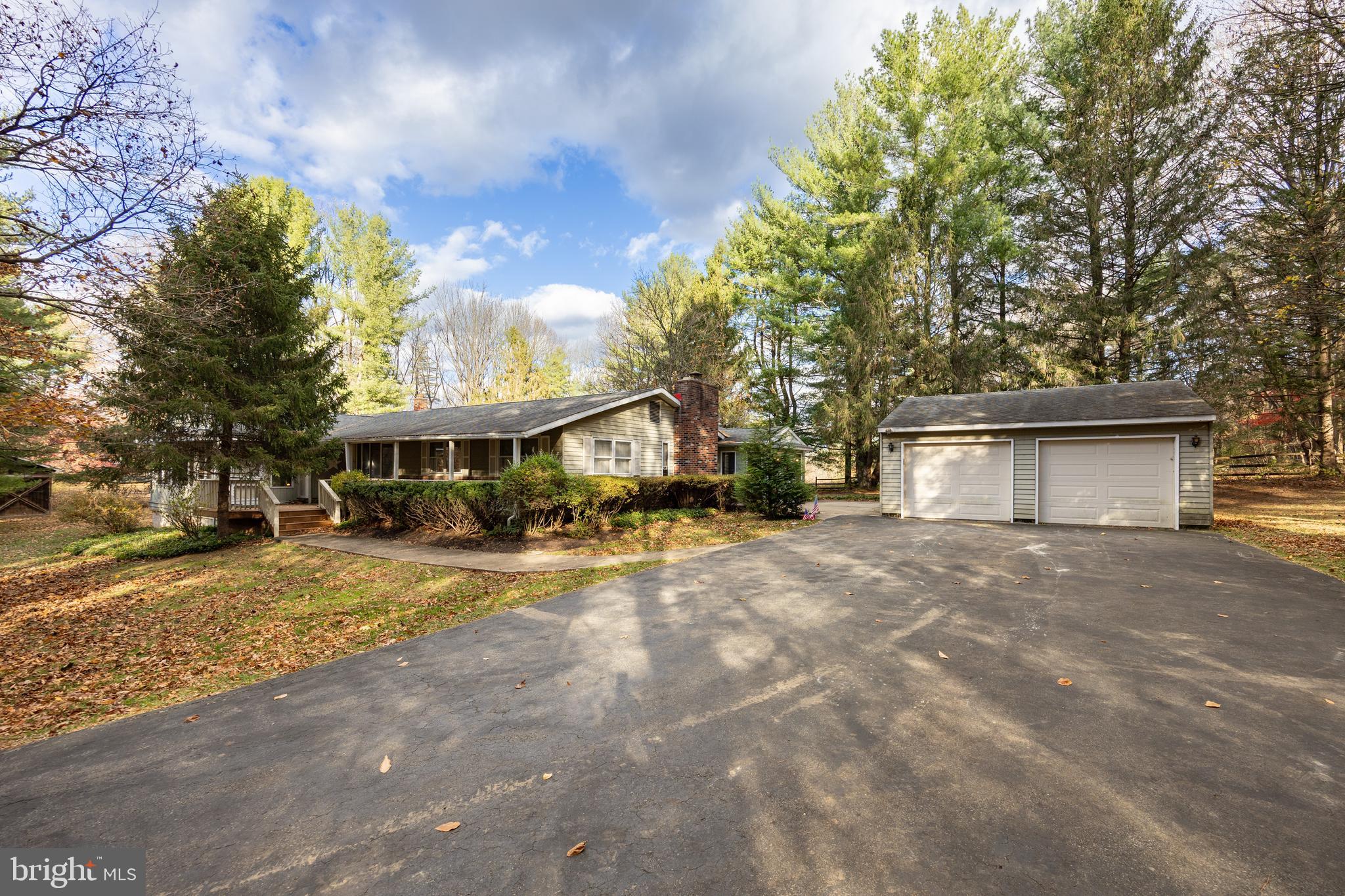 741 Haines Mill Road West Chester, PA 19382 - Photo 3 of 25 a view of a house with a yard and large tree