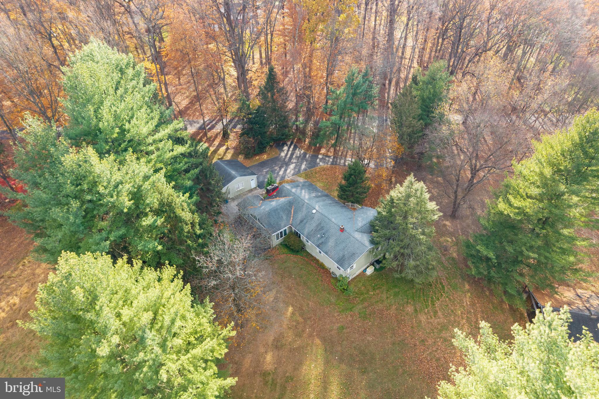 741 Haines Mill Road West Chester, PA 19382 - Photo 4 of 25 a backyard of a house with a yard and outdoor seating