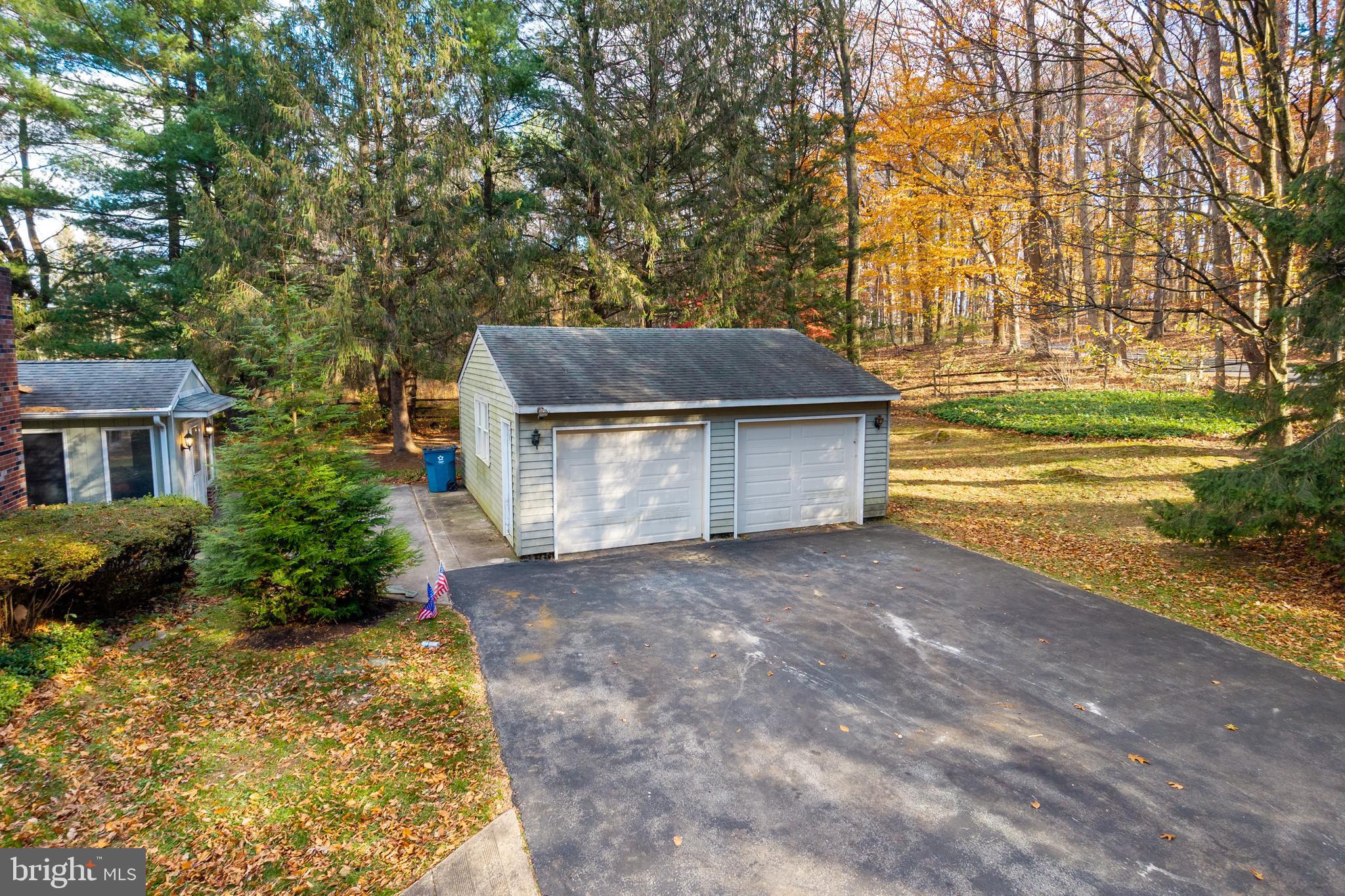 741 Haines Mill Road West Chester, PA 19382 - Photo 6 of 25 a front view of a house with a yard and garage
