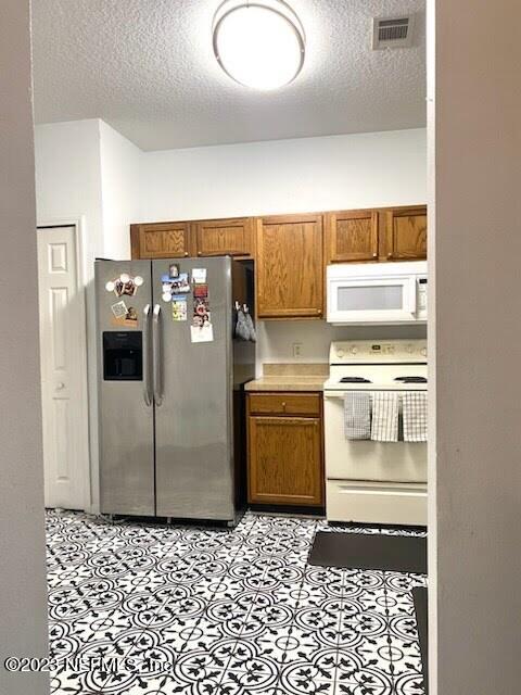 7823 Melvin Road Jacksonville, FL 32210 - Photo 10 of 36 Kitchen Enterance