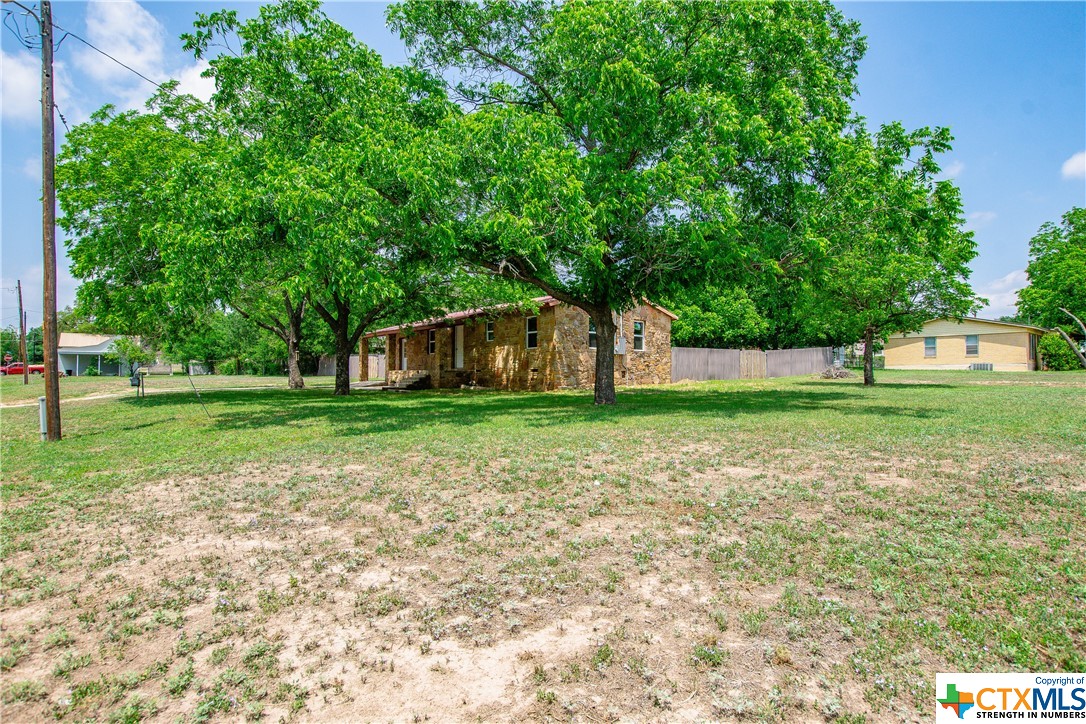 a house view with garden space