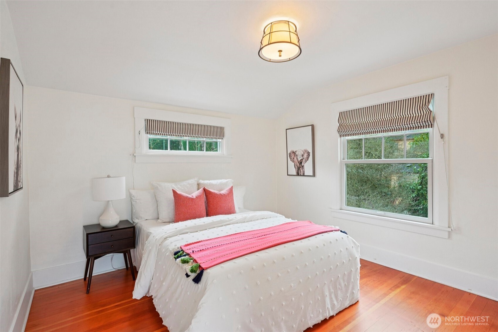 3141 Broadway East Seattle, WA 98102 - Photo 20 of 40 a bedroom with a bed and a window