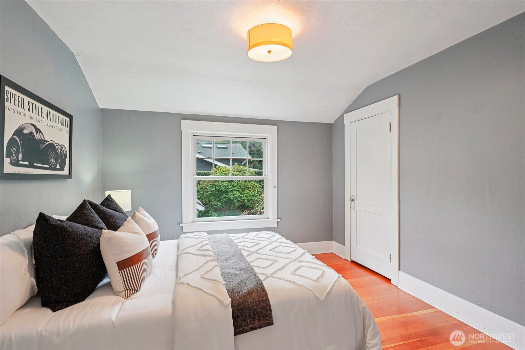 3141 Broadway East Seattle, WA 98102 - Photo 24 of 40 a bedroom with a bed and window