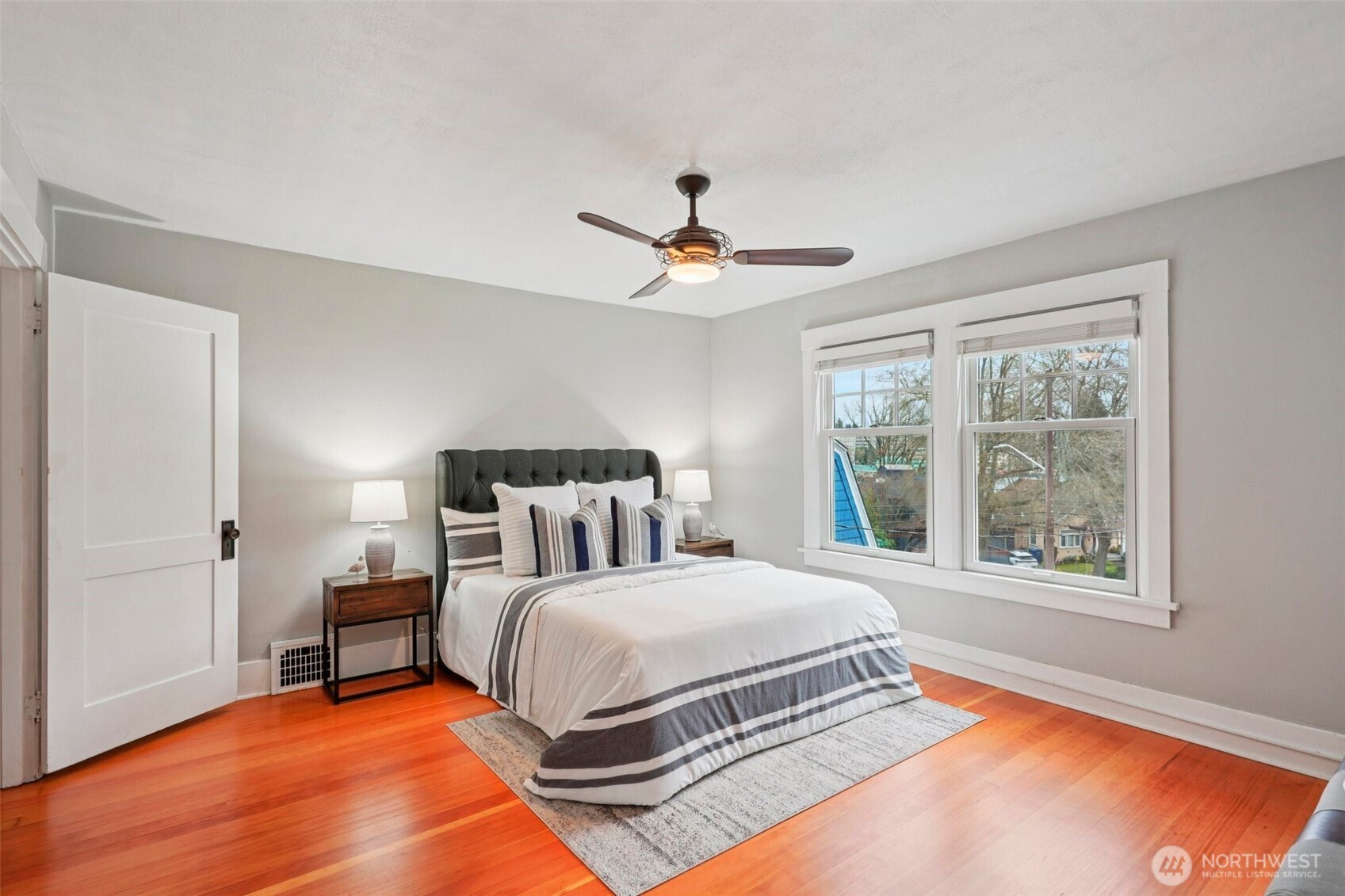 3141 Broadway East Seattle, WA 98102 - Photo 27 of 40 a bedroom with a large bed and a window