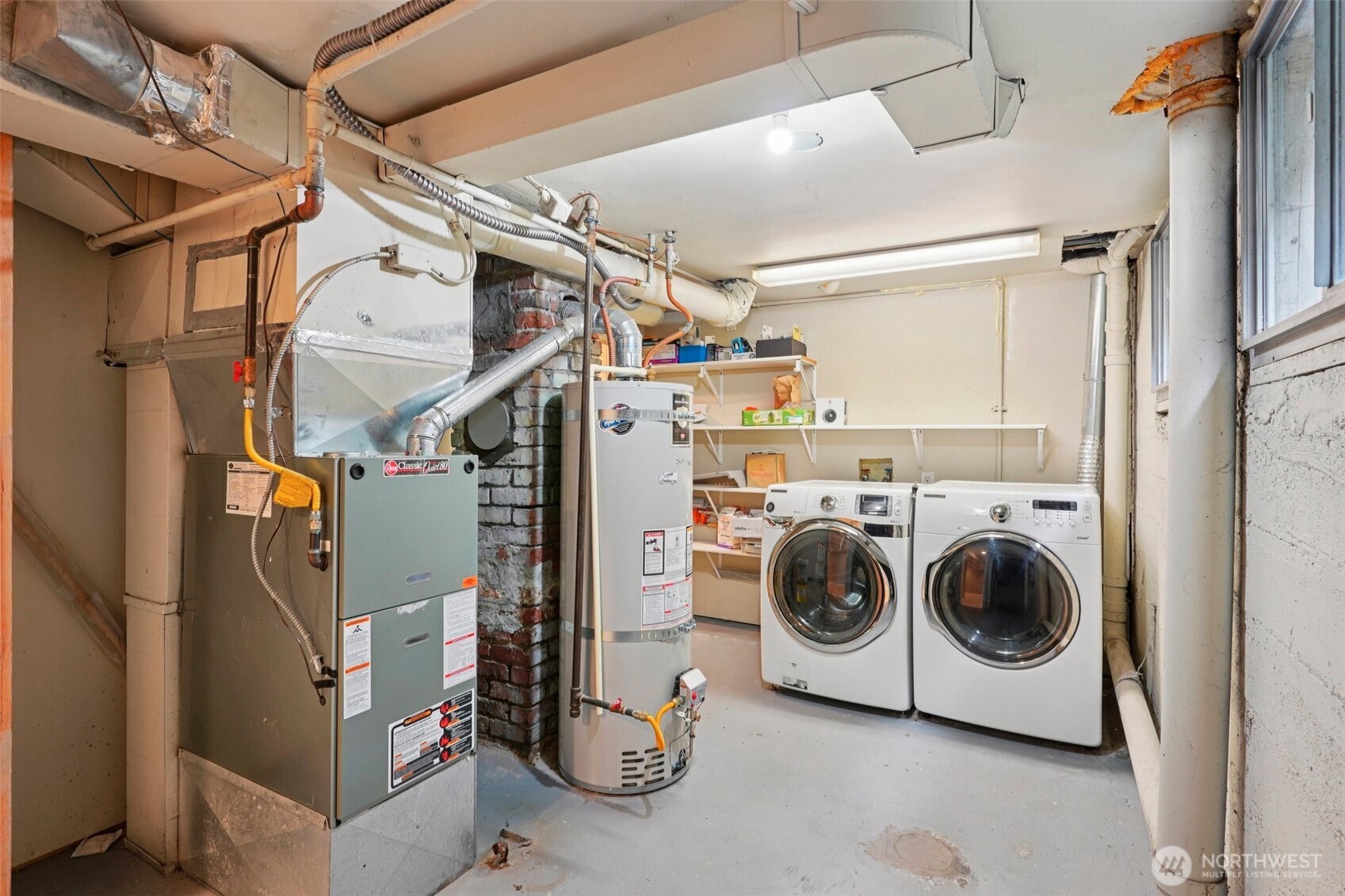 3141 Broadway East Seattle, WA 98102 - Photo 33 of 40 a utility room with dryer and washer