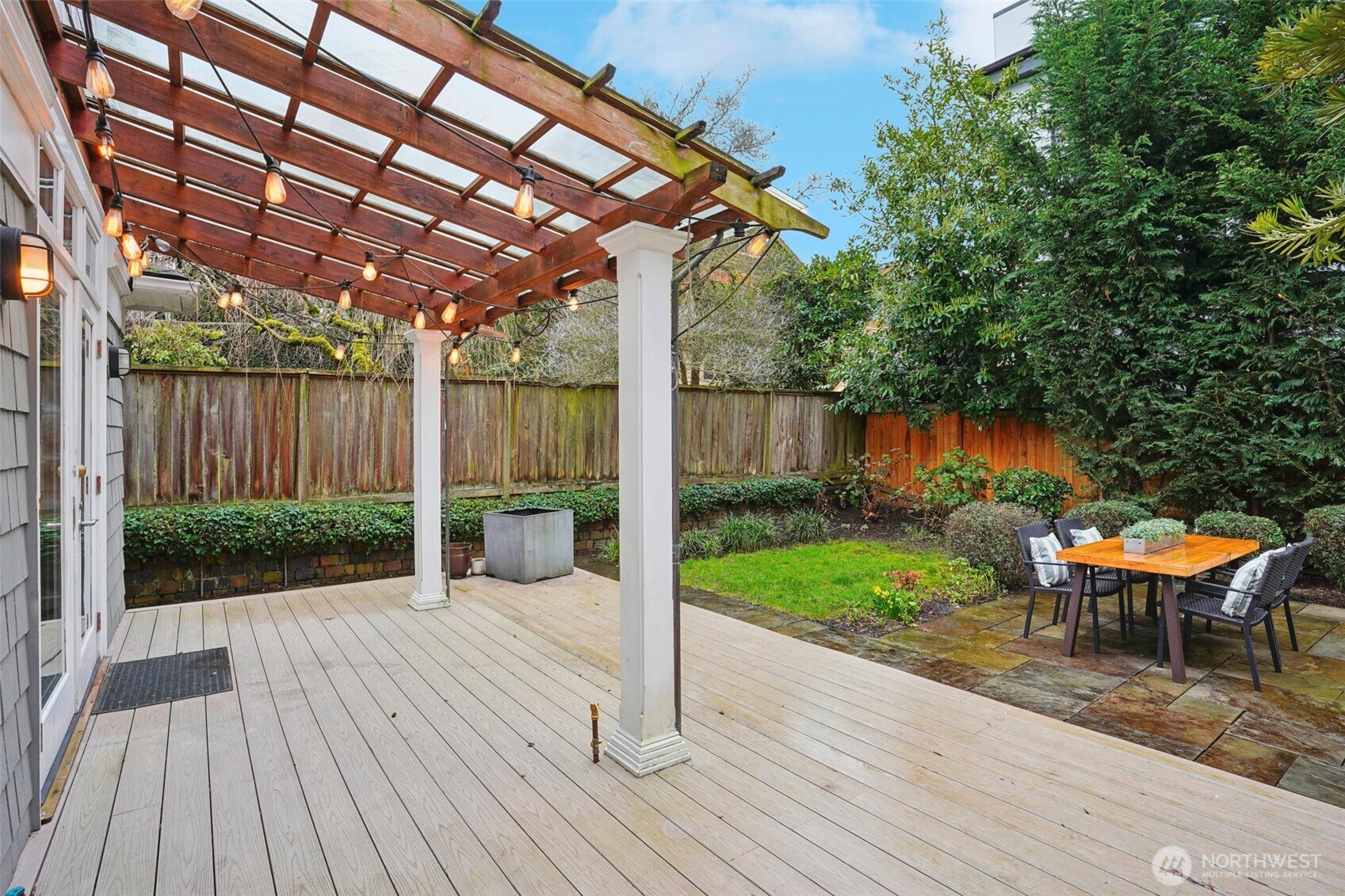 3141 Broadway East Seattle, WA 98102 - Photo 35 of 40 a view of a backyard with sitting area and garden