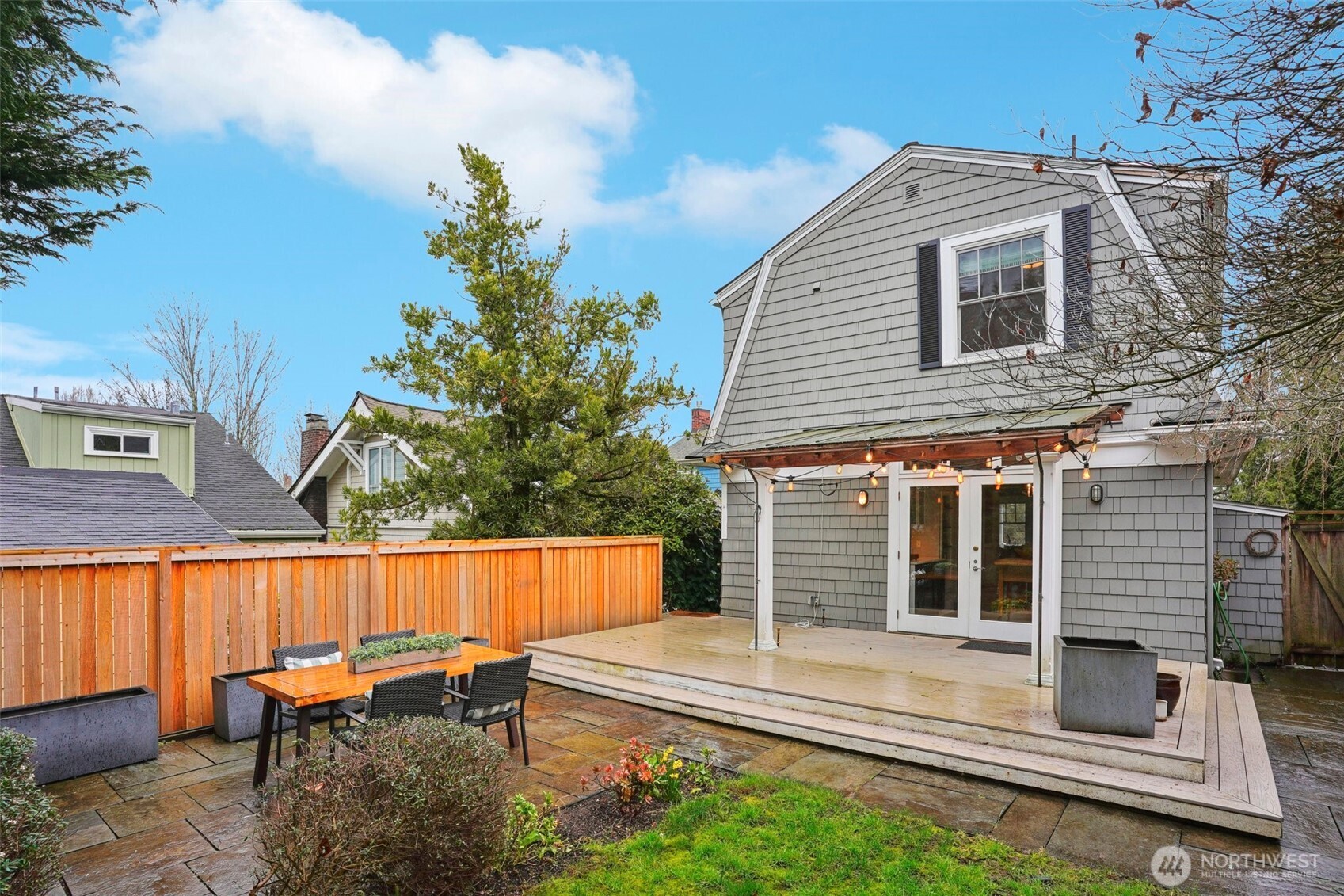3141 Broadway East Seattle, WA 98102 - Photo 37 of 40 a backyard of a house with table and chairs