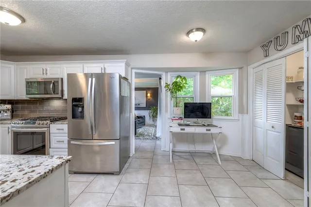 $500,000 | 10501 Sagamore Road, Leawood, KS 66206