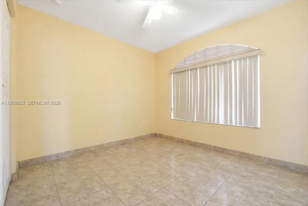 an empty room with windows