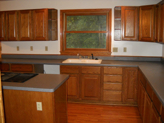 20364 Free Church Road Caledonia, IL 61011 - Photo 4 of 6 a kitchen with stainless steel appliances granite countertop a sink stove and cabinets
