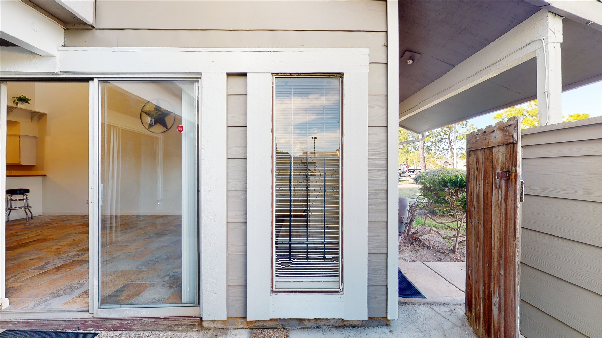 12250 Copper Tree Pvt Lane Houston, TX 77035 - Photo 13 of 26 There is a door on the side to access patio area