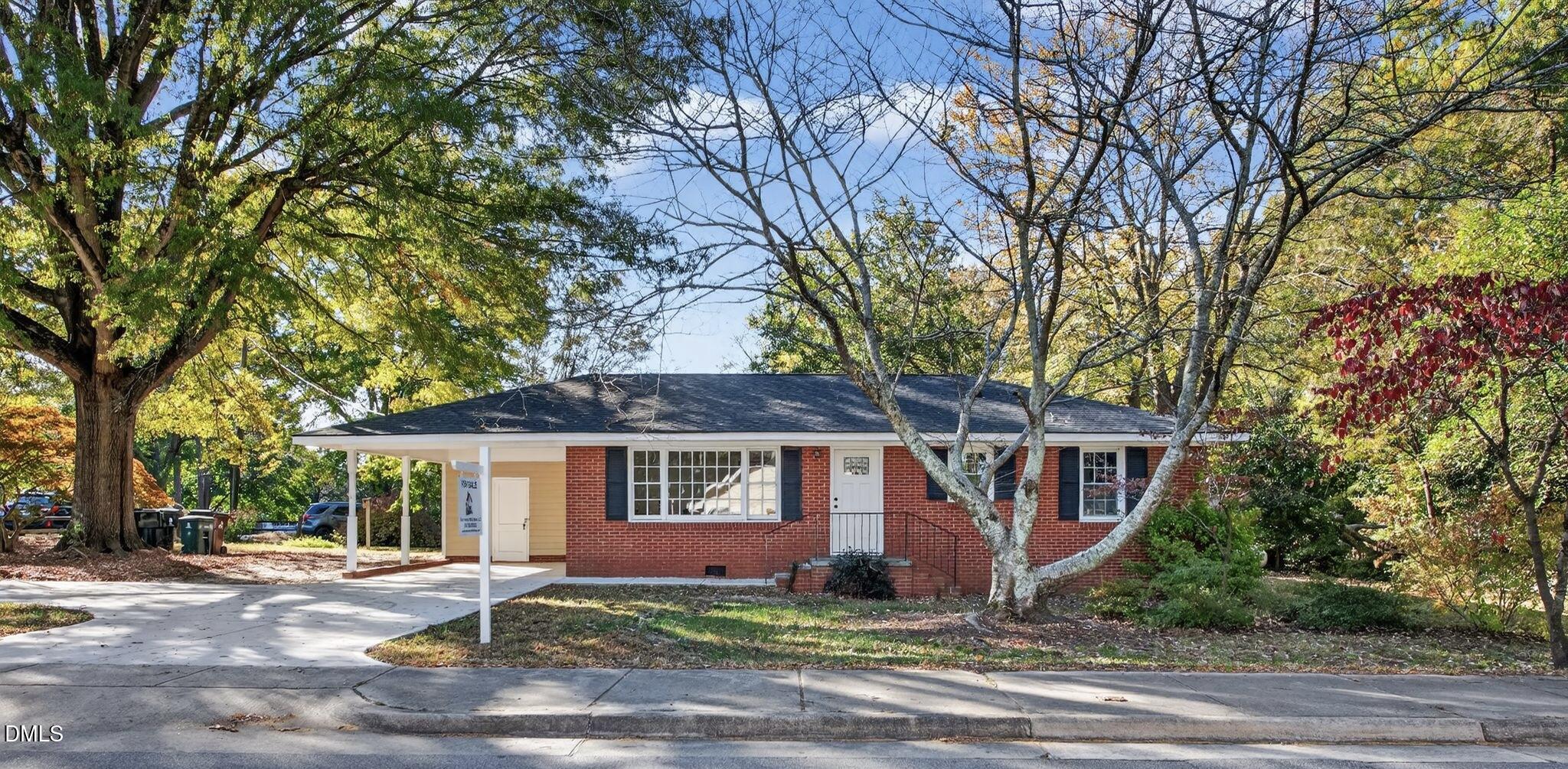 518 East 3rd Street Wendell, NC 27591 - Photo 1 of 30 a front view of a house with a garden