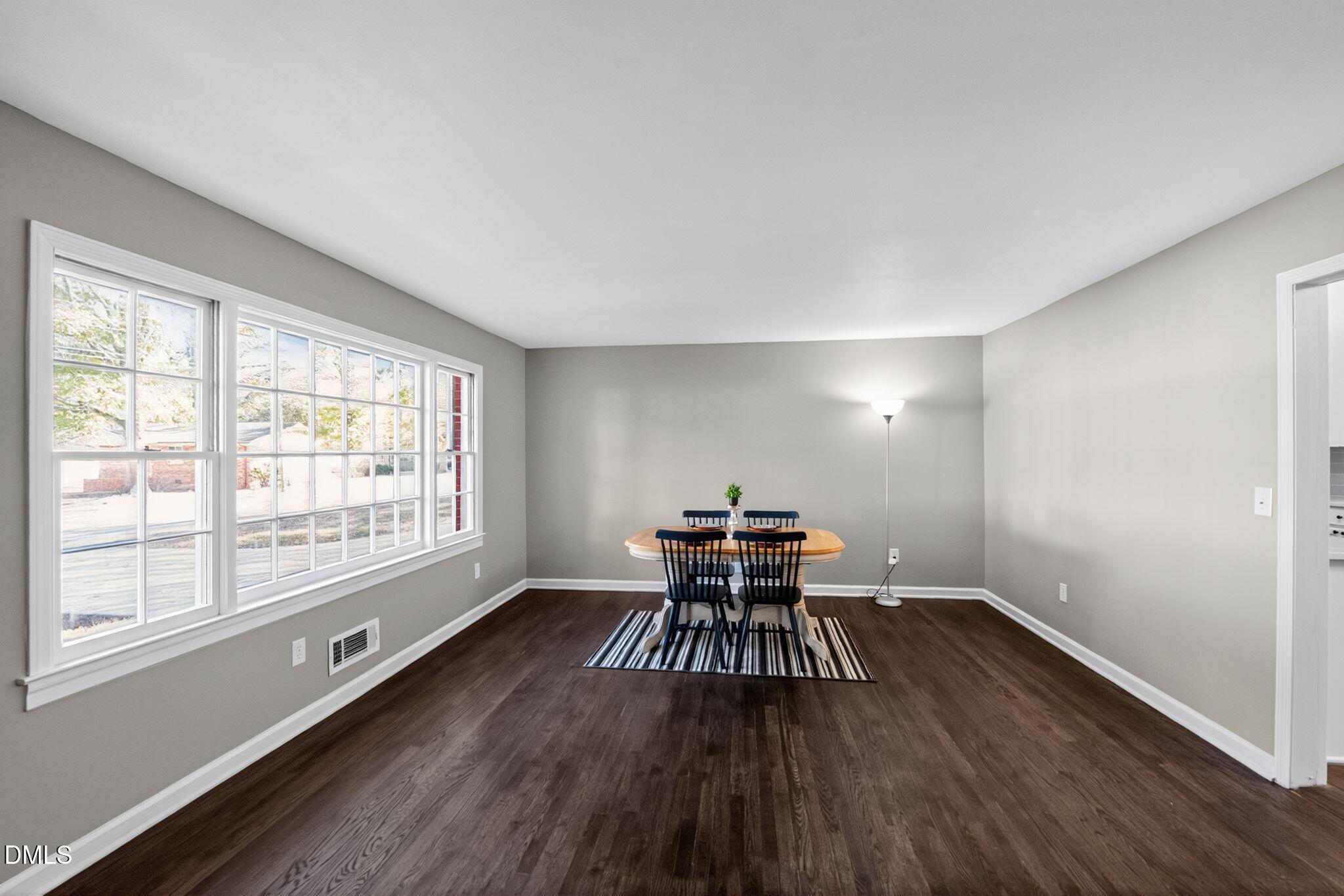 518 East 3rd Street Wendell, NC 27591 - Photo 11 of 30 wooden floor in an empty room with a window