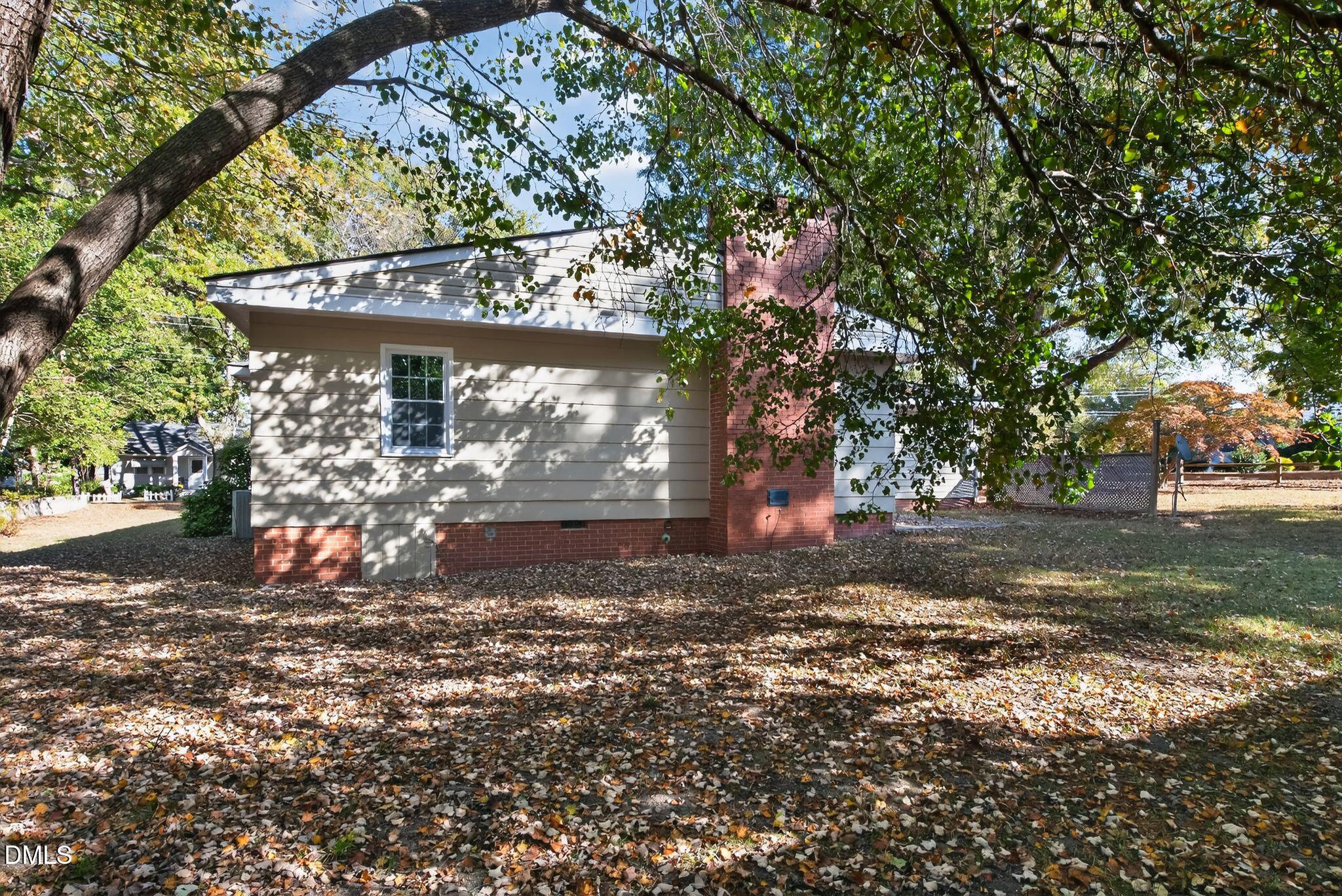 518 East 3rd Street Wendell, NC 27591 - Photo 29 of 30 a view of a yard with a tree