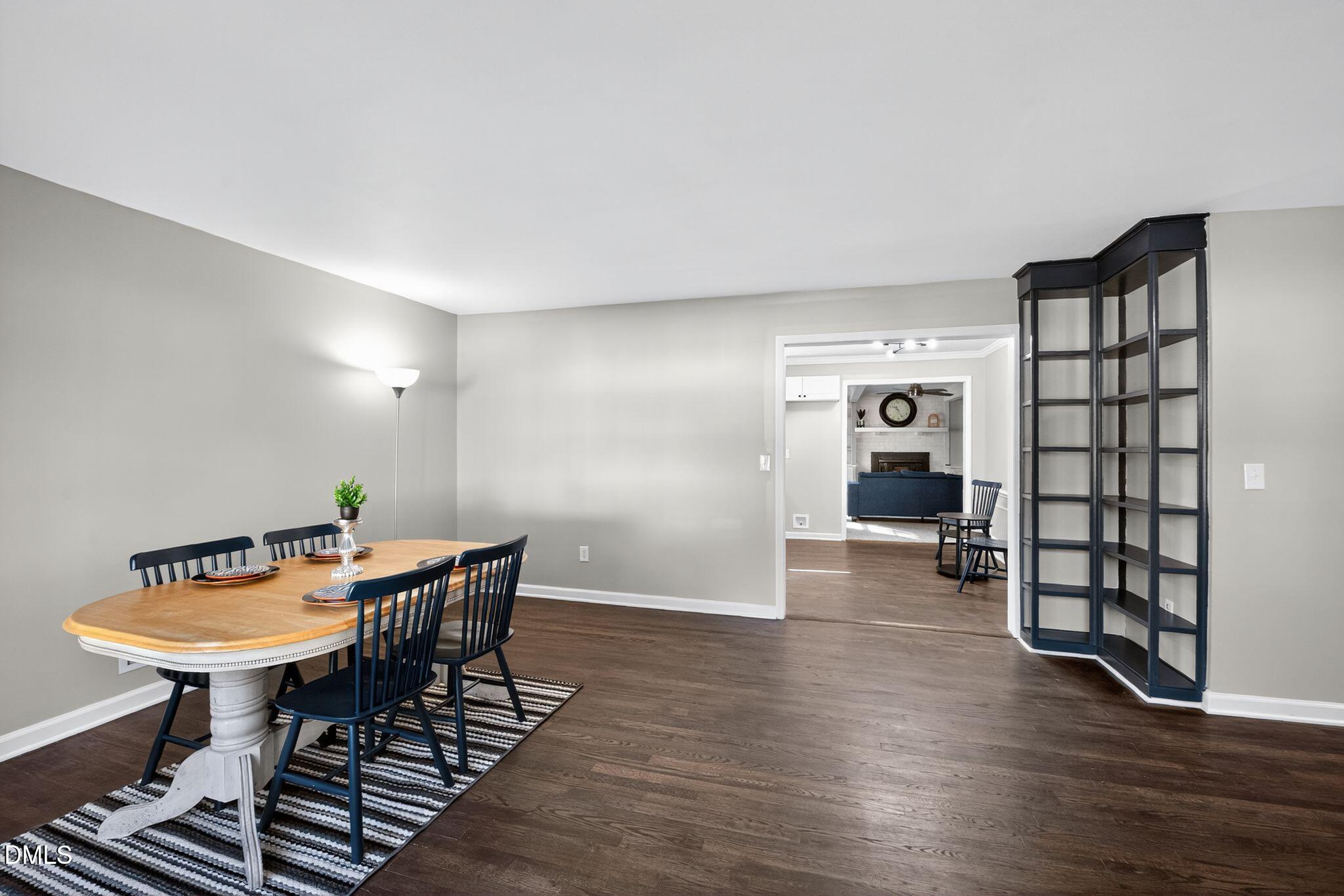518 East 3rd Street Wendell, NC 27591 - Photo 10 of 30 a view of a livingroom with furniture and wooden floor