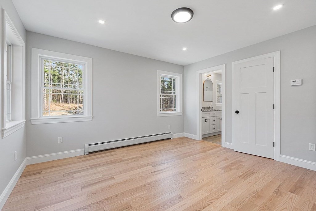 245 Brookside Road Orange, MA 01364 - Photo 14 of 29 an empty room with windows and closet