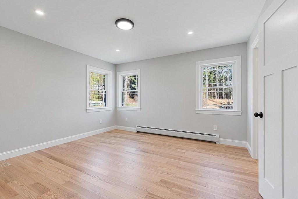 245 Brookside Road Orange, MA 01364 - Photo 20 of 29 wooden floor in an empty room with a window