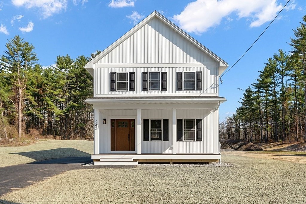 245 Brookside Road Orange, MA 01364 - Photo 2 of 29 a view of a house with a yard