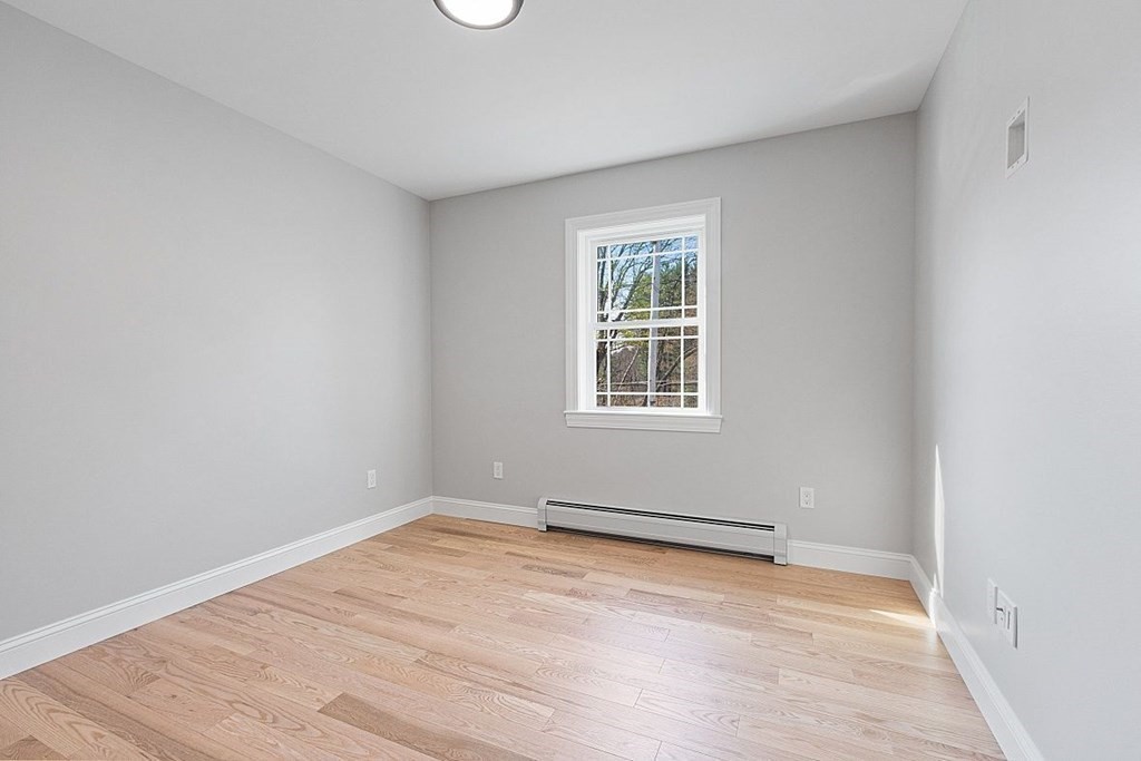 245 Brookside Road Orange, MA 01364 - Photo 21 of 29 an empty room with a window