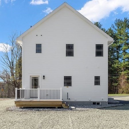 245 Brookside Road Orange, MA 01364 - Photo 22 of 29 a view of a house with a yard
