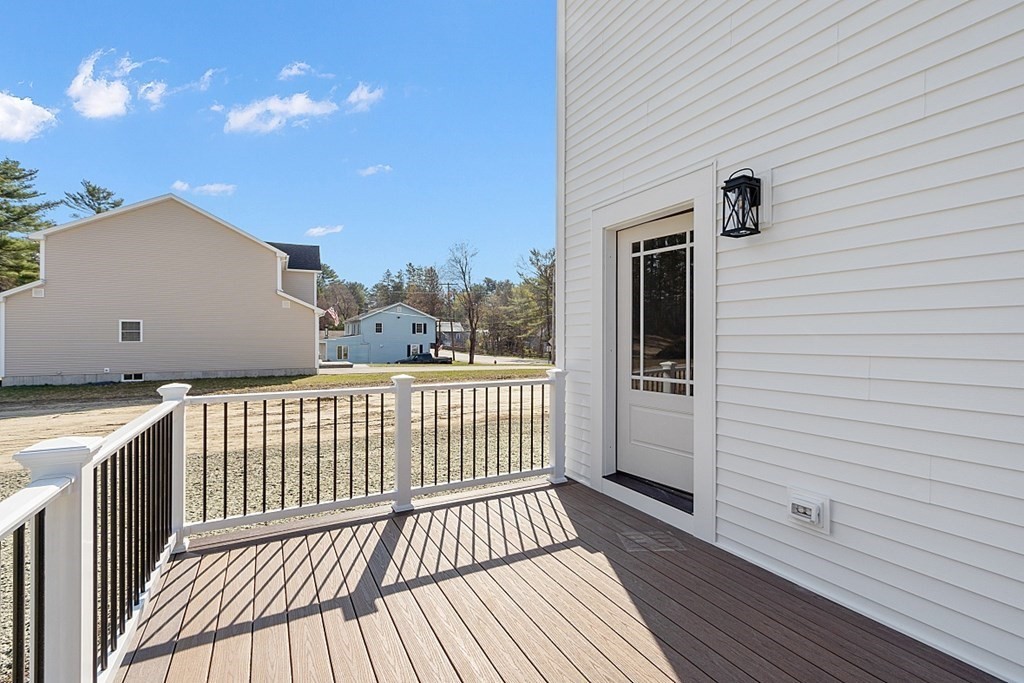 245 Brookside Road Orange, MA 01364 - Photo 24 of 29 a view of a balcony with wooden floor