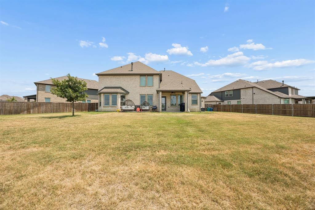 3200 Willowbrook Road Northlake, TX 76226 - Photo 27 of 29 Spacious two-story residence featuring a tan stucco exterior with multiple gabled rooflines and a curved bay window