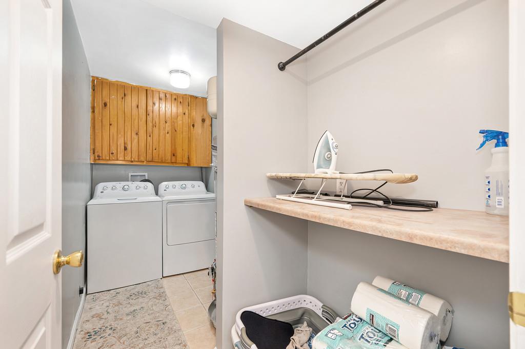 5682 Virginiatown Road Newcastle, CA 95658 - Photo 10 of 56 Indoor laundry room with cabinets.