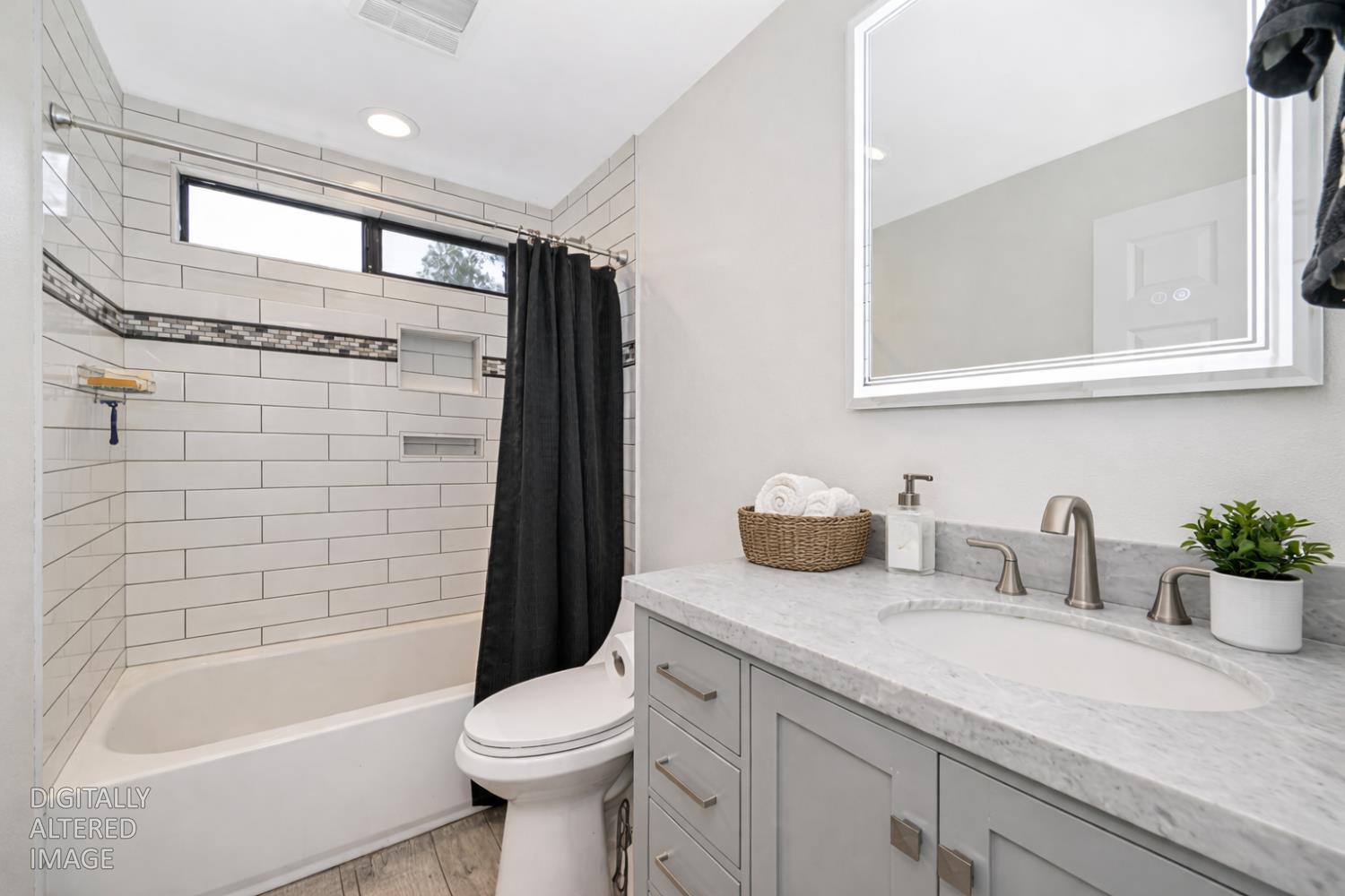 5682 Virginiatown Road Newcastle, CA 95658 - Photo 16 of 56 2nd bathroom featuring updated vanity, shower / bath combo, and floors.