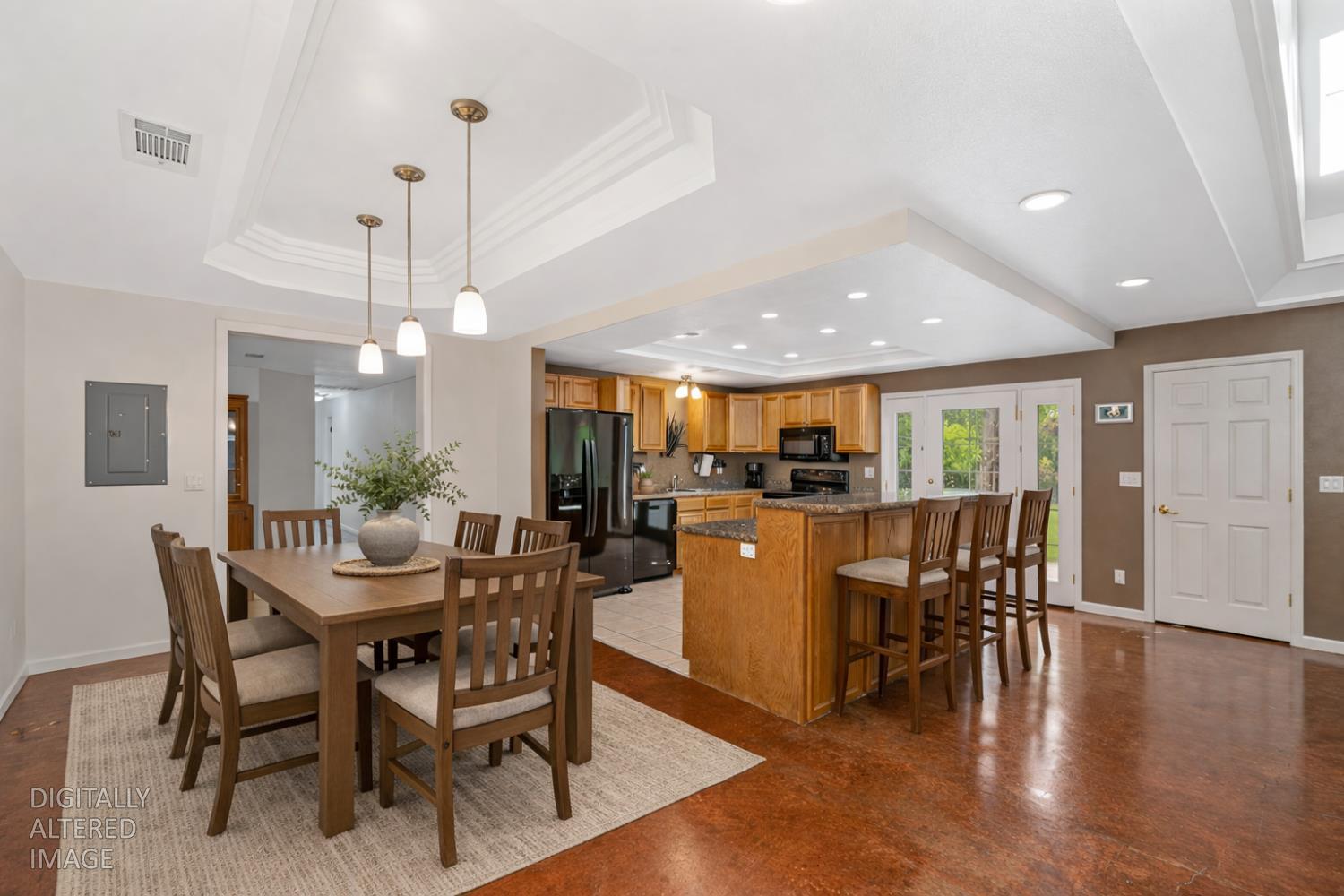 5682 Virginiatown Road Newcastle, CA 95658 - Photo 6 of 56 Dining area with a tray ceiling, finished concrete flooring, and recessed lighting