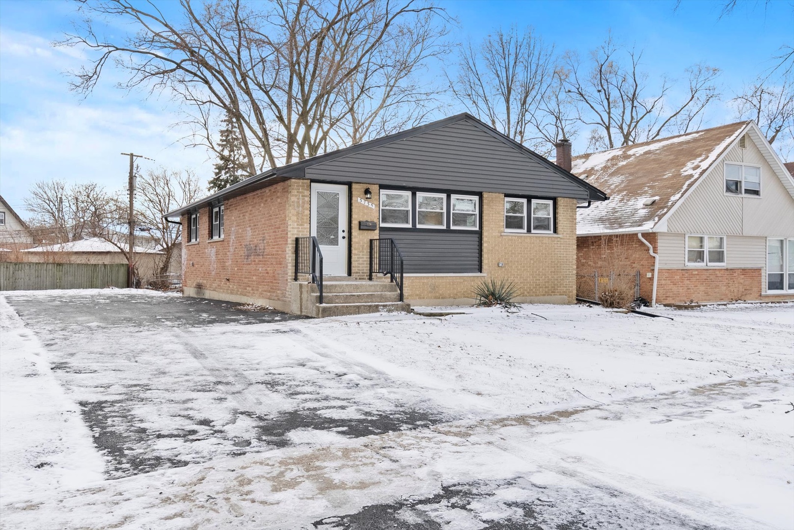 3735 169th Street Country Club Hills, IL 60478 - Photo 2 of 17 a front view of a house with a yard and garage