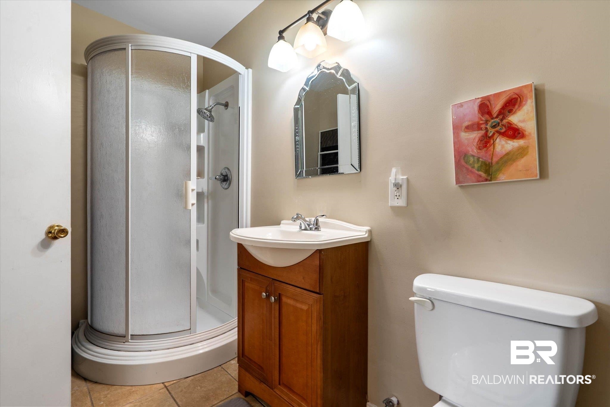 559 East Cumberland Road Mobile, AL 36608 - Photo 41 of 48 Full bathroom with a shower stall, vanity, and light tile patterned flooring