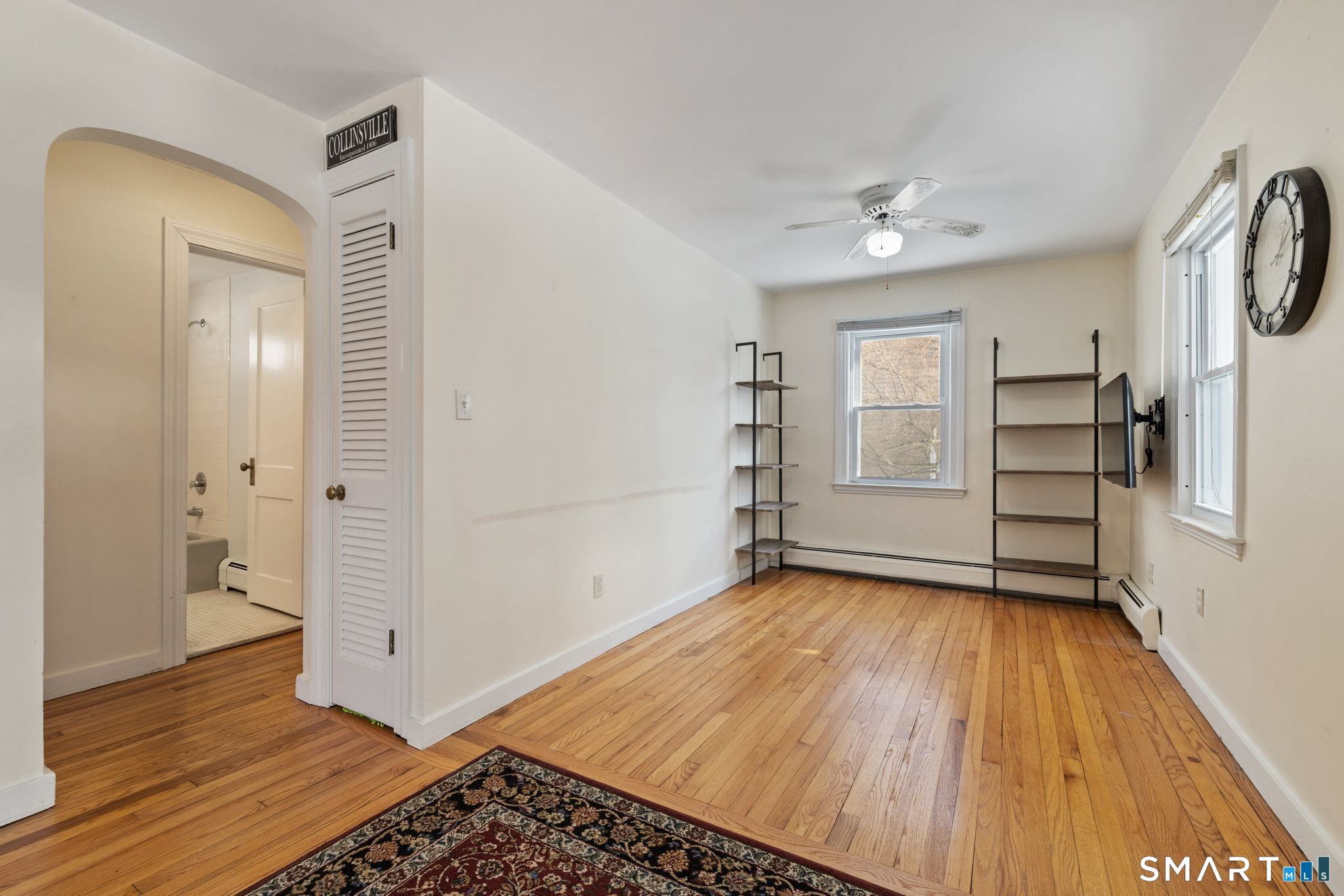 10 School Street Burlington, CT 06013 - Photo 11 of 35 wooden floor in an empty room with a window