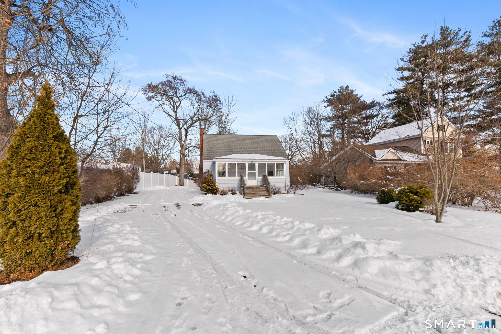 10 School Street Burlington, CT 06013 - Photo 2 of 35 a view of a house with a snow in the yard