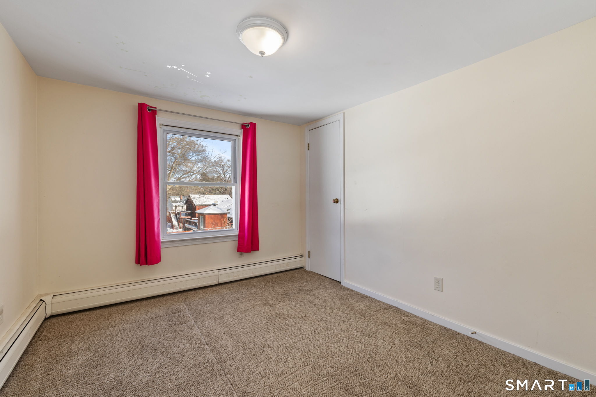 10 School Street Burlington, CT 06013 - Photo 27 of 35 an empty room with window