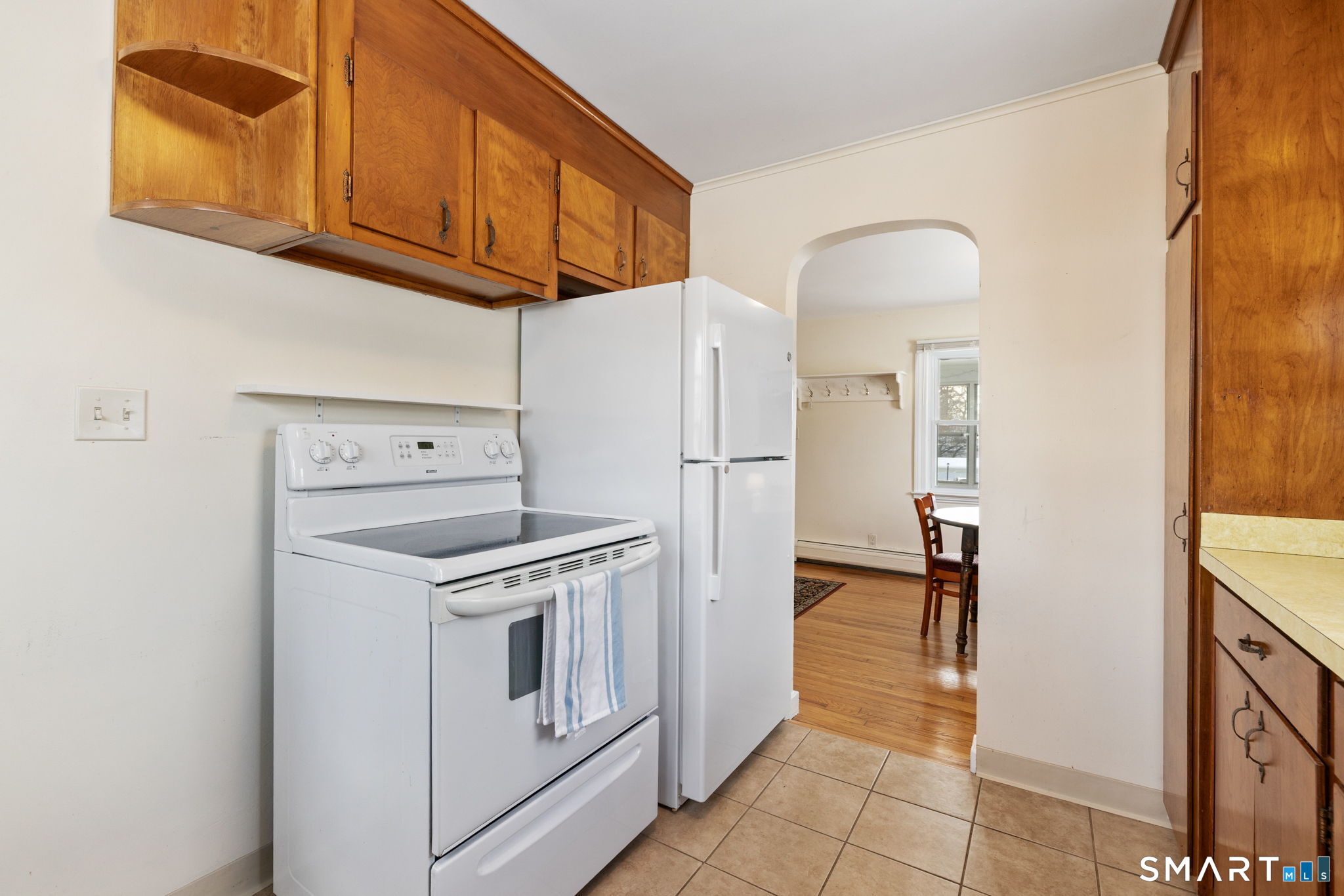 10 School Street Burlington, CT 06013 - Photo 7 of 35 a kitchen with stainless steel appliances granite countertop a refrigerator and a stove