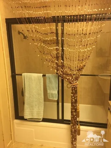 a view of a bathroom with a small window